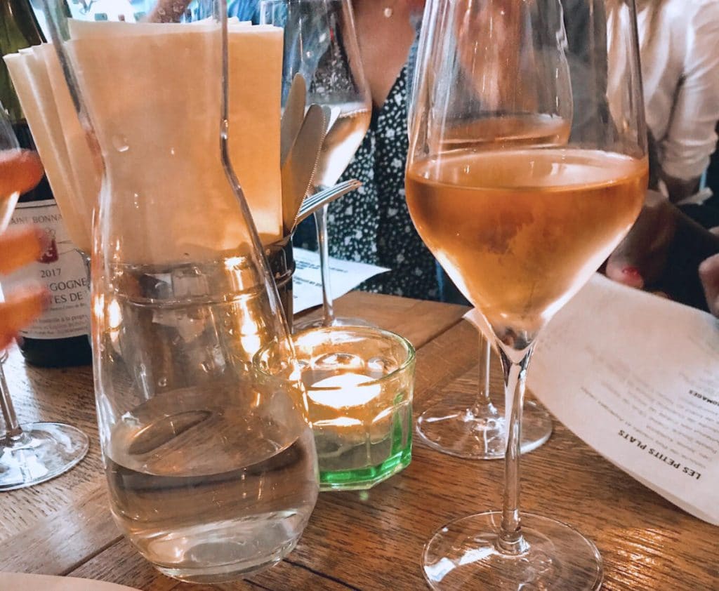 a rose wine glass at dinner