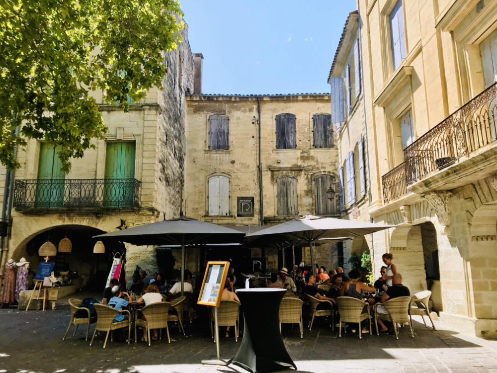 Restaurant terrasse in the town of Uzès, France