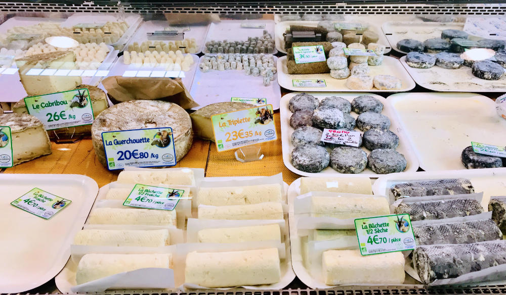 cheese display at a marché