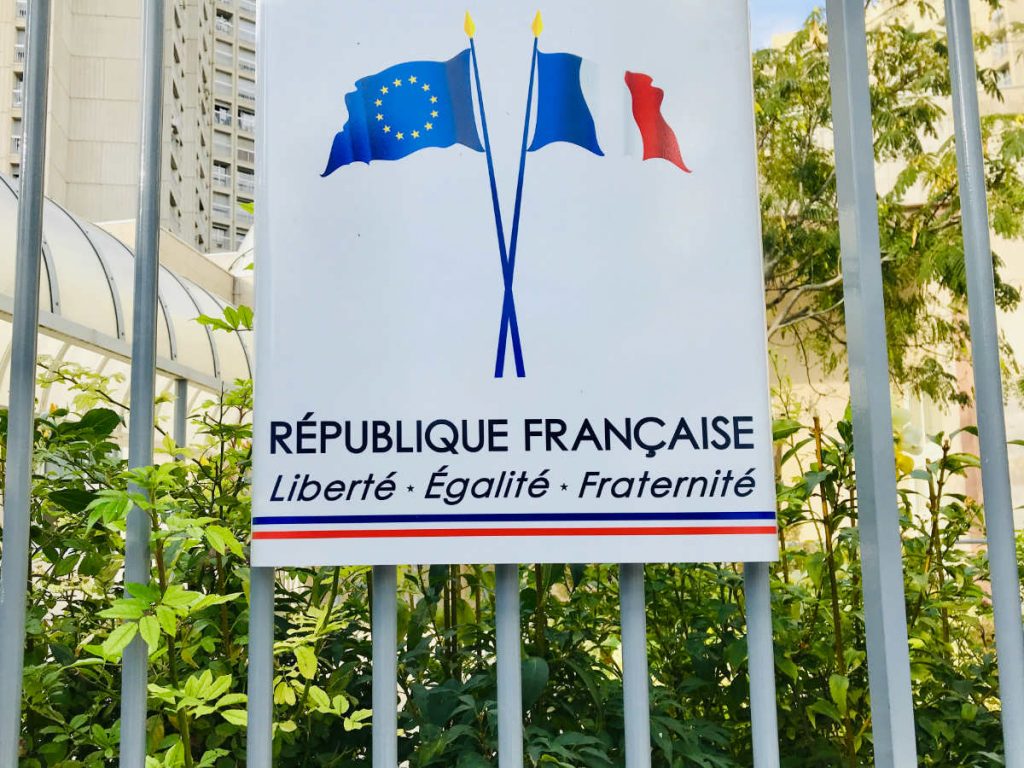 sign in front of a French school