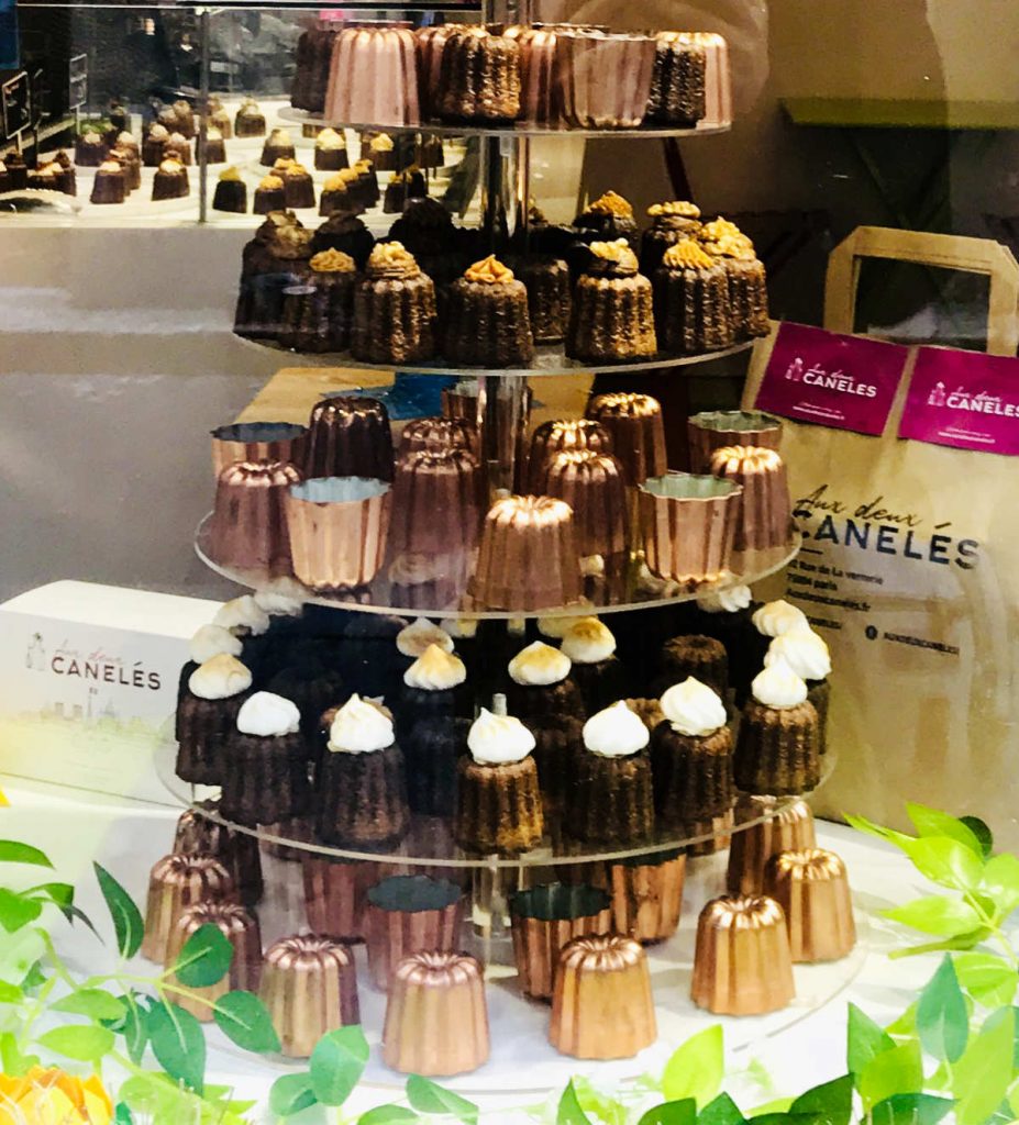 caneles on a stand