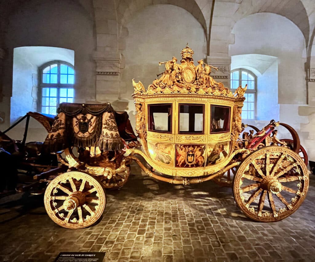 Golden coach in the Galerie de Carosse at Chateau de Versailles