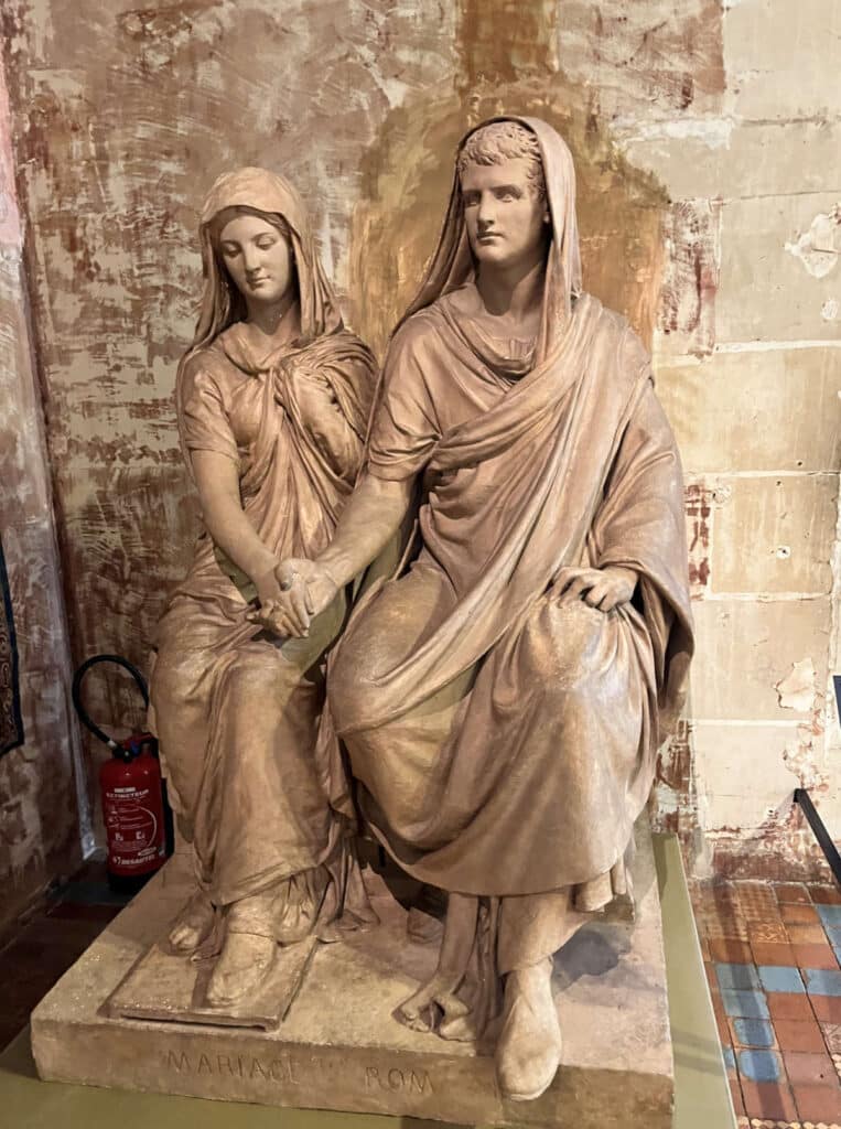 Roman wedding statues at a Château de Blois museum in France
