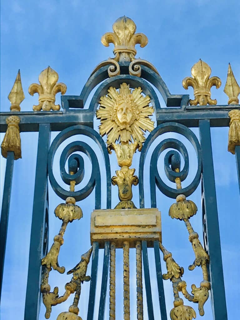 golden gate at Palace of Versailles with fleur de lis