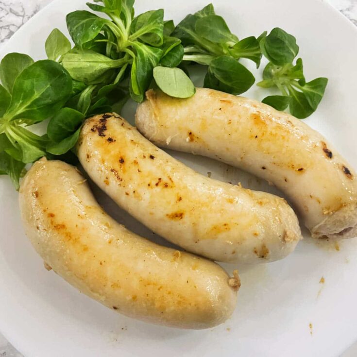 Cooking French white sausages (Boudin blanc) 1