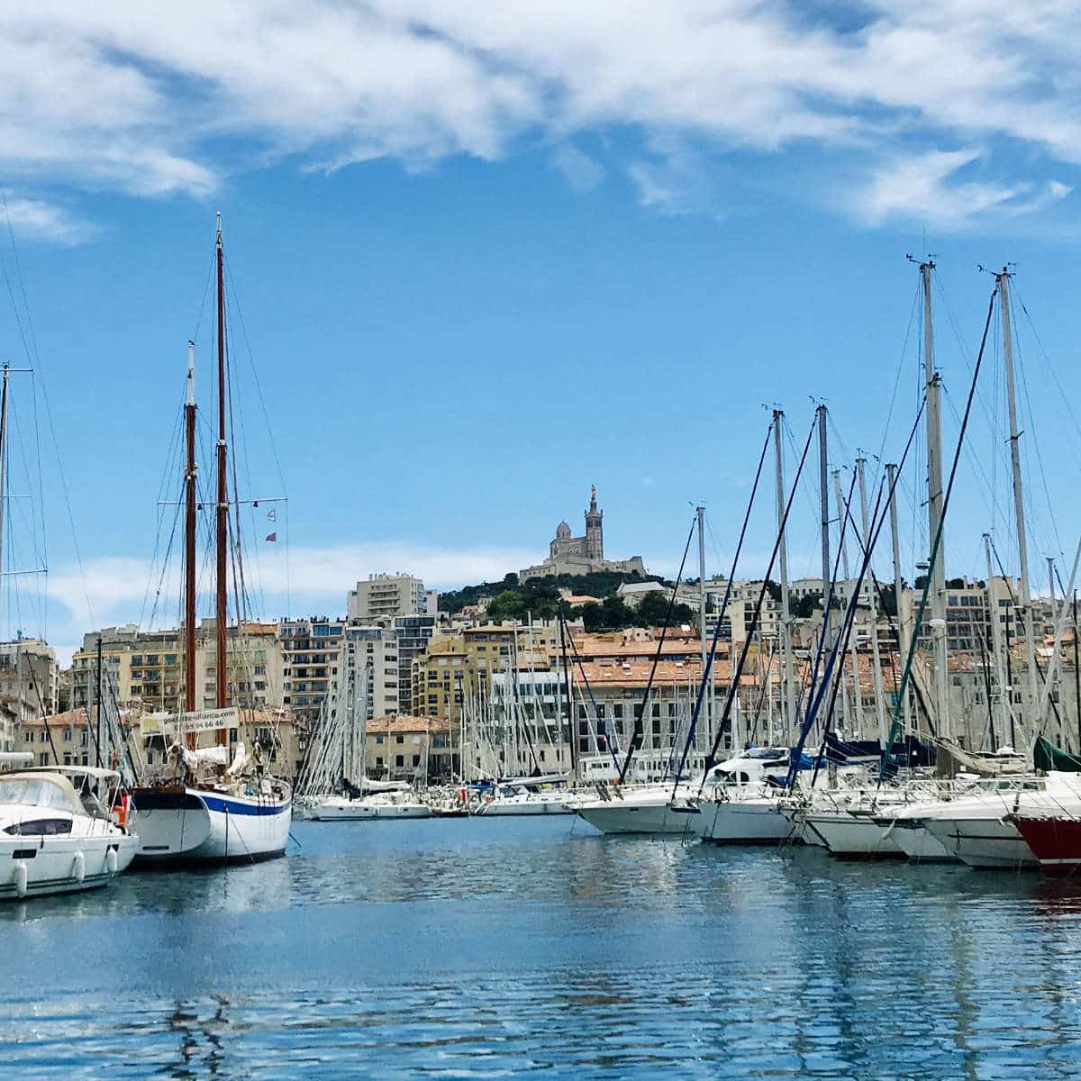 Vieux Port Marseille with Notre Dame de la Garde in the distance